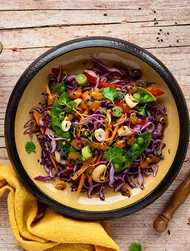 Red cabbage salad with cashews & peas