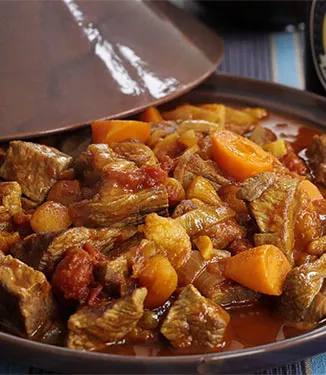 Lamb tagine with roasted vegetable cous cous
