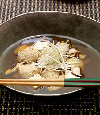 Japanese soup with chicken and tofu dumplings