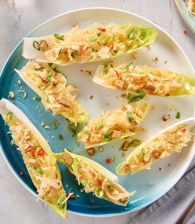 Endive boats with sauerkraut & tofu