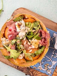 Rocket salad with melon & prosciutto