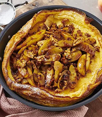 Easy Dutch Baby pancake with apple and walnut
