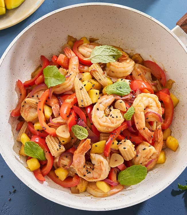 Shrimp stir-fry with mango and mint