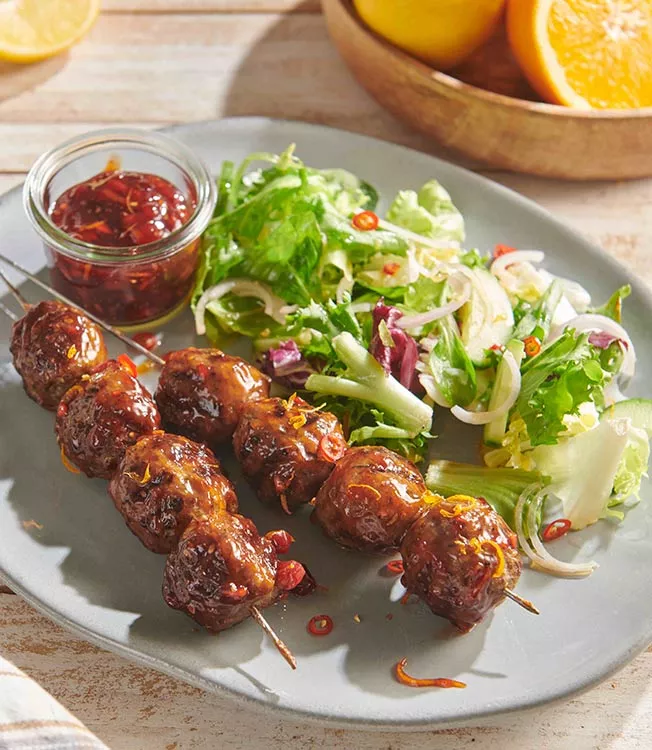 Grilled meatballs with cranberry glaze