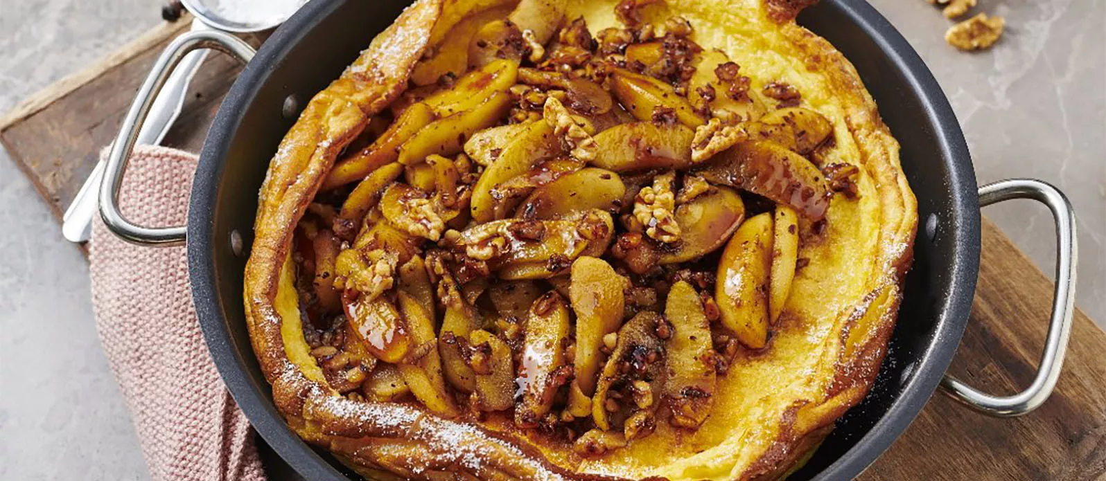 Easy Dutch Baby pancake with apple and walnut