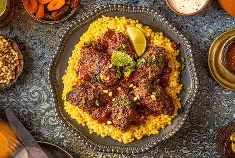 Beef kofta in rich tomato-soy sauce