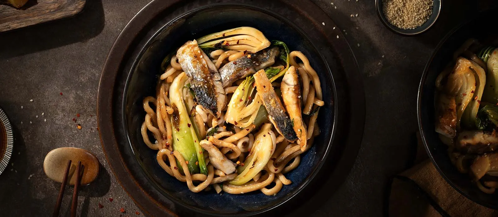 Wok-fried sea bass with udon noodles