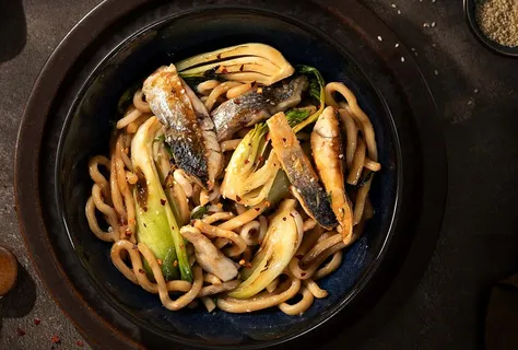 Wok-fried sea bass with udon noodles