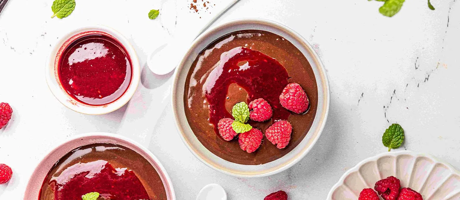 Chocolate rice pudding with raspberry sauce
