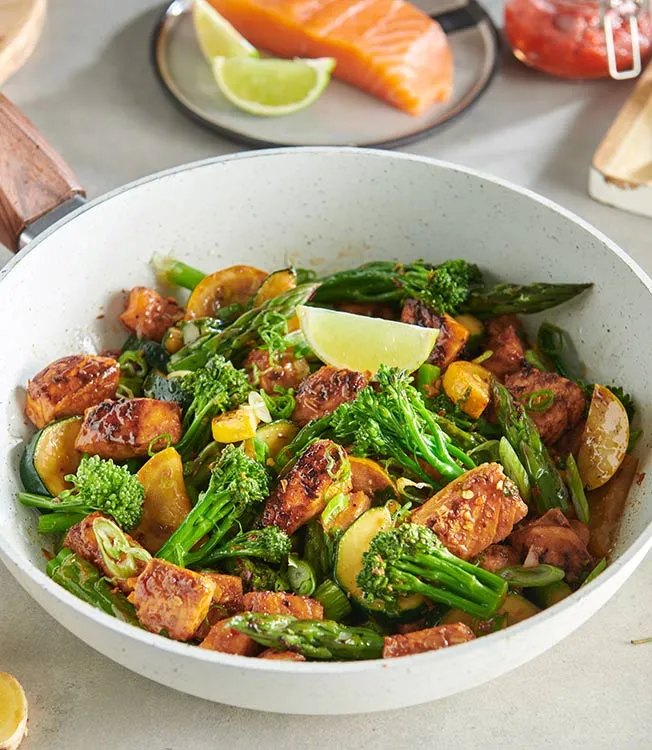 Spicy harissa salmon & veg stir-fry