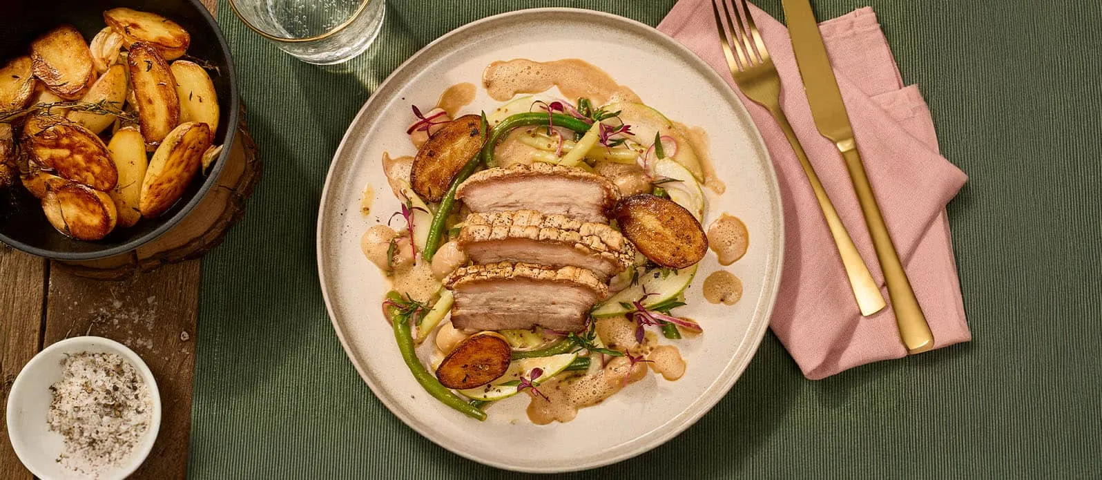 Crispy pork belly with bean salad & fondant potatoes