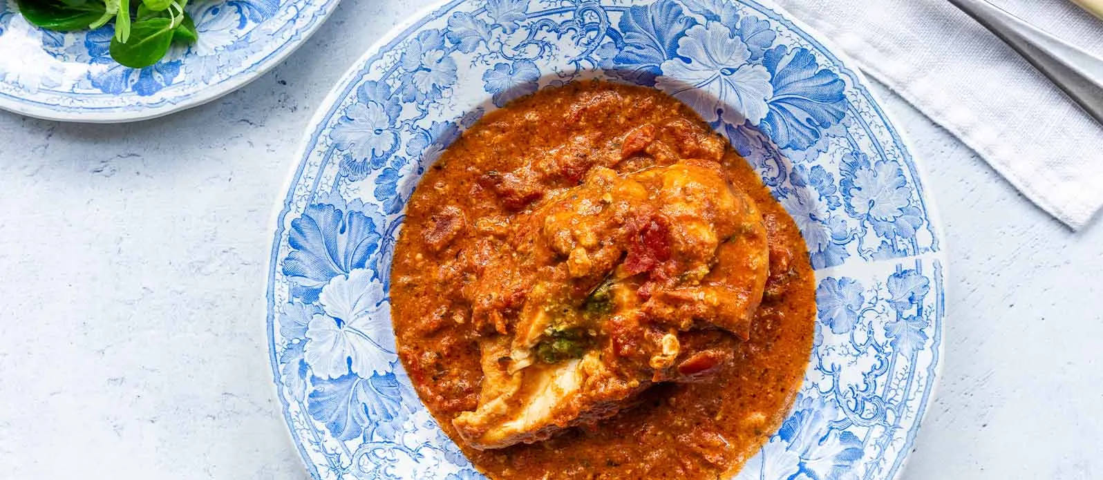Stuffed Chicken Breasts in Tomato Sauce with Spinach, Cashews, and Soy sauce