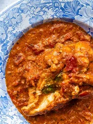 Stuffed Chicken Breasts in Tomato Sauce with Spinach, Cashews, and Soy sauce