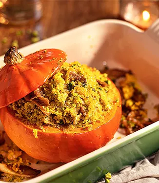 Stuffed Hokkaido pumpkin with oyster mushrooms and pistachios