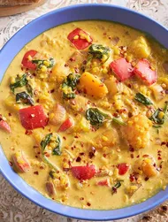 Moong dal with pumpkin, mango and coconut