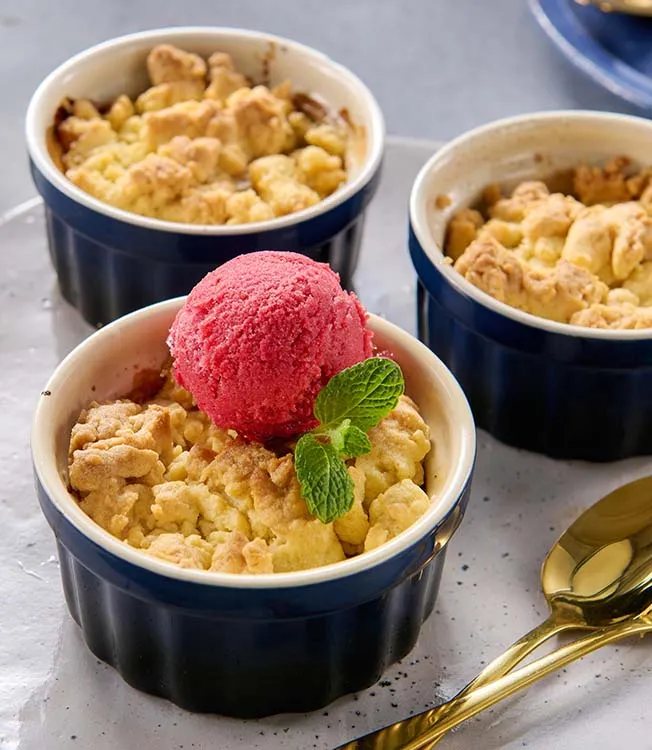 Pear and apple crumble with plant topping