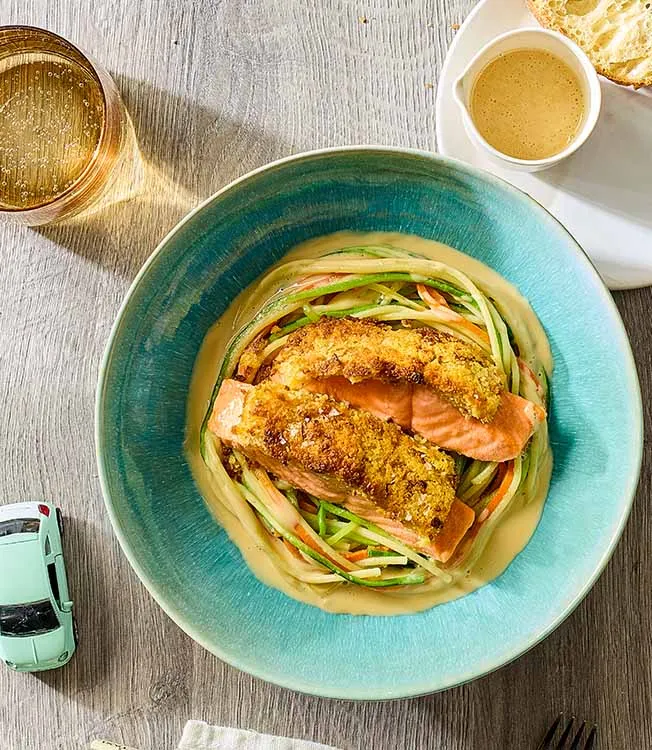 Crispy salmon on spaghetti-zoodle nest