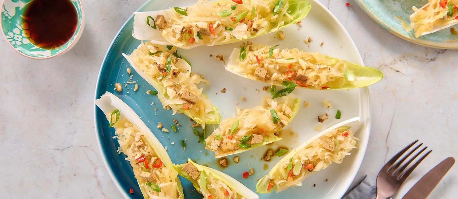 Endive boats with sauerkraut & tofu