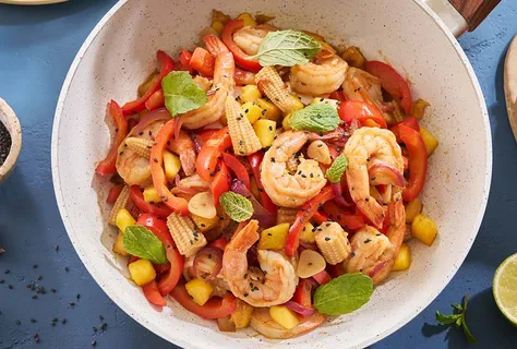 Shrimp stir-fry with mango and mint