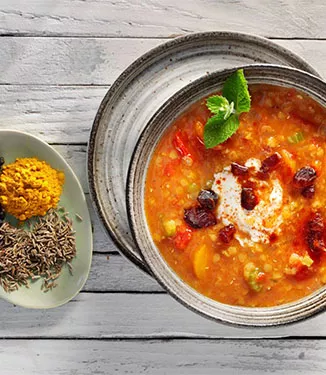 Red Lentil Soup with Spicy Yoghurt and Date Cubes