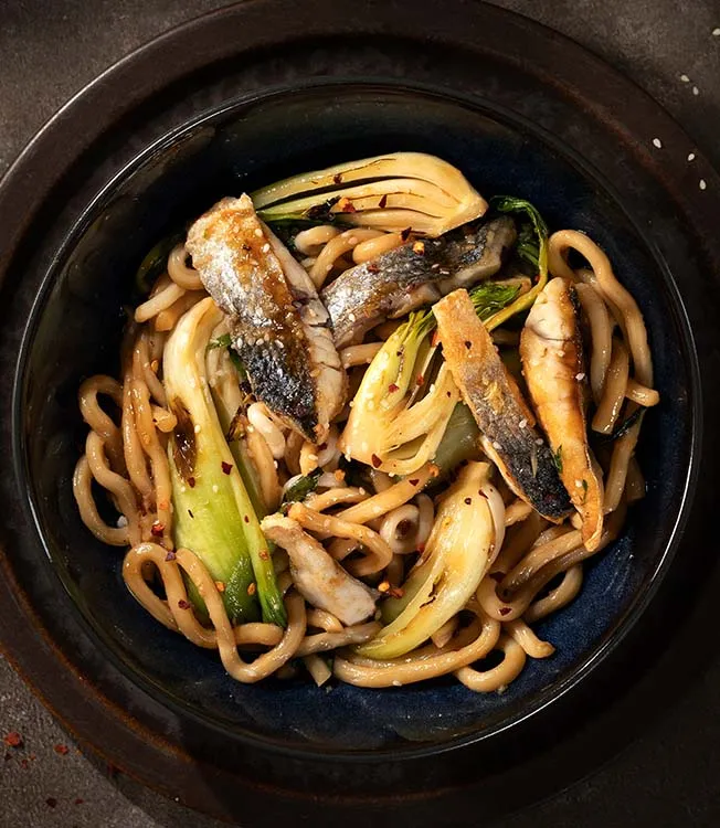 Wok-fried sea bass with udon noodles
