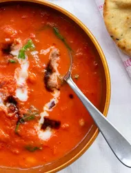 Creamy tomato stew with white beans and spinach