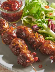 Grilled meatballs with cranberry glaze