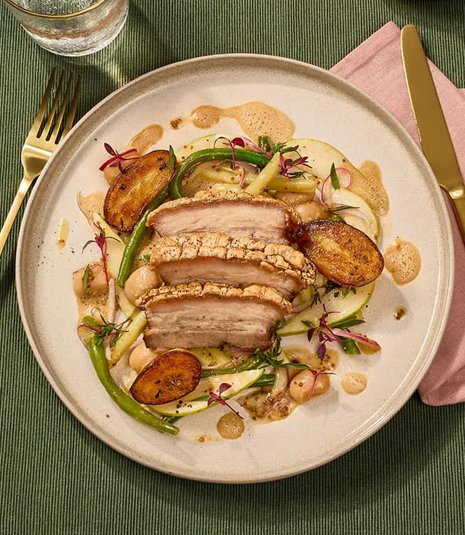Crispy pork belly with bean salad & fondant potatoes