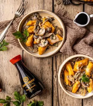Sweet potato dumplings with mushroom sauce