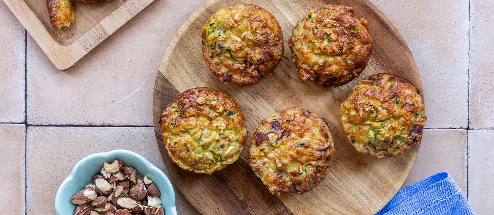 Savoury Muffins with Zucchini, Chopped Almonds, Soy Sauce, and Grated Cheese
