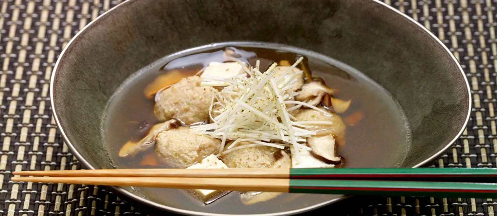 Japanese soup with chicken and tofu dumplings