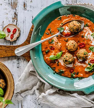 Millet balls in a spicy curry sauce
