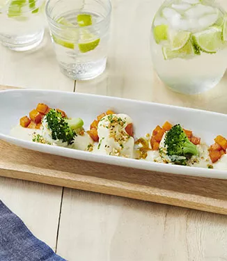 Broccoli au gratin, cauliflower and glazed sweet pumpkin with crispy soy sauce crumbles