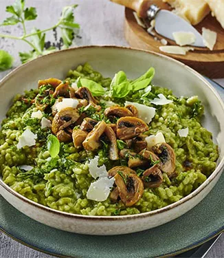Green herb risotto with roasted mushrooms