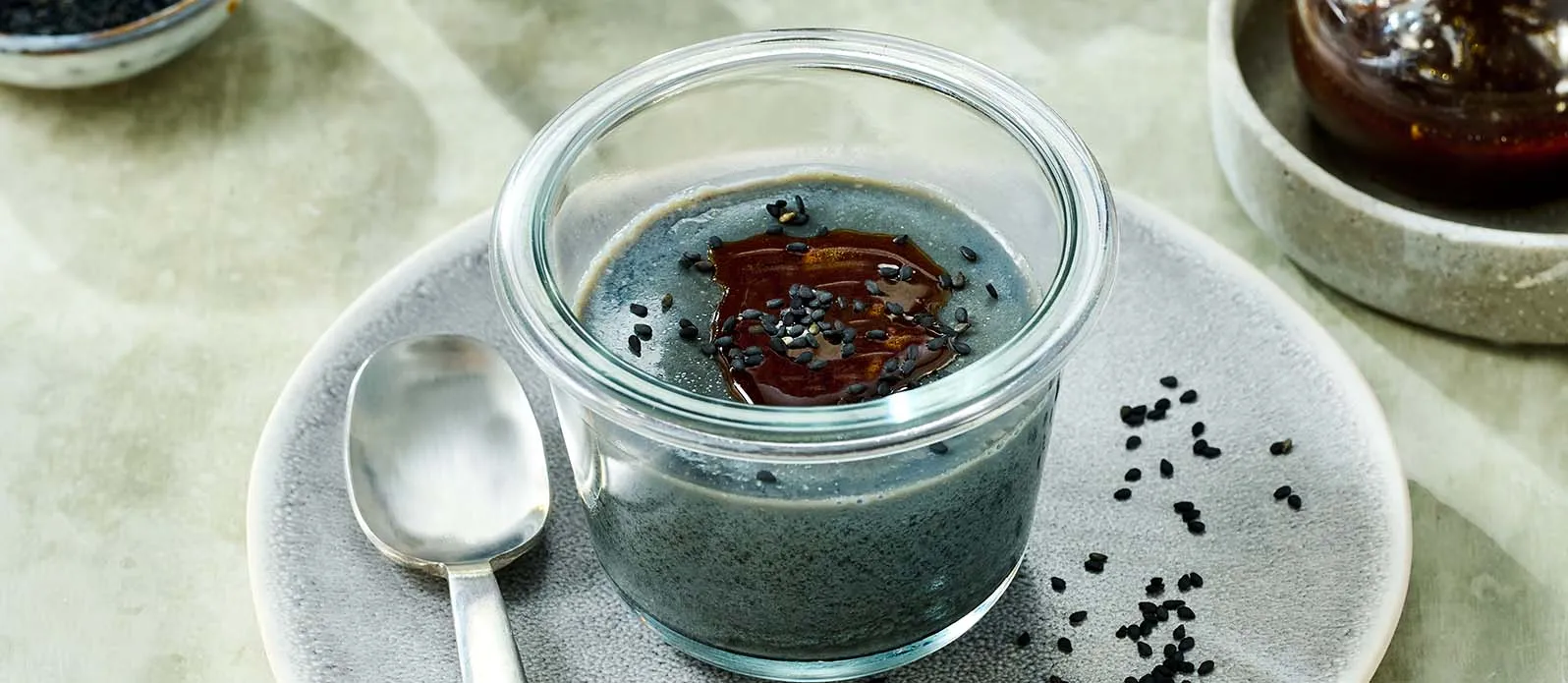 Vegan goma panna cotta with black tahini