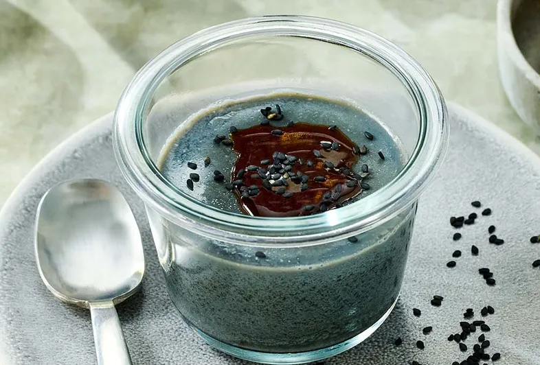 Vegan goma panna cotta with black tahini