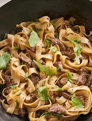 Beef stir-fry with tagliatelle & rocket