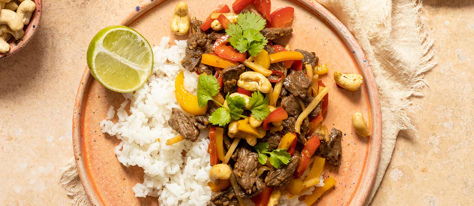 Stir fry beef in teriyaki sauce with cashew nuts and jasmine rice